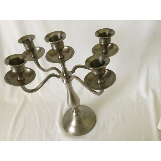 This candelabra in brushed Pewter was made by Restoration Hardware, known for its high quality furniture, lighting and...
