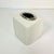 This is a modern contemporary enameled white Tissue Box Cover that has a silver oval opening at the top. Great Box Cover...