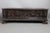 Walnut cassone chest opening with a lid at the top. The front panel is carved with a scene of figures and angels. Putti...