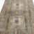 This vintage Turkish Kars rug showcases the distinctive large medallions characteristic of traditional Kars designs. The...