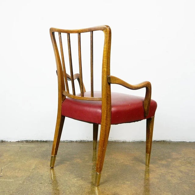 This elegant and comfortable Set of six Dining Armchairs was designed by the Austrian architect and designer Oswald...