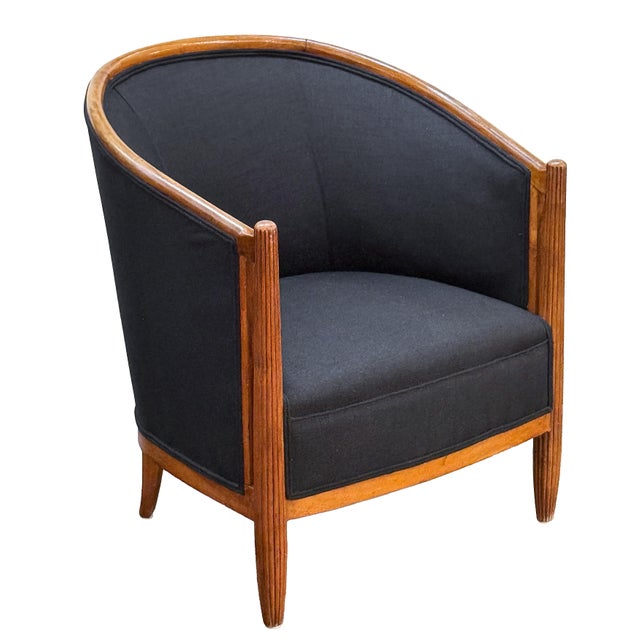 A beautiful pair of French lounge armchairs in the Art Deco style, created in the manner of iconic designer Paul Follot,...