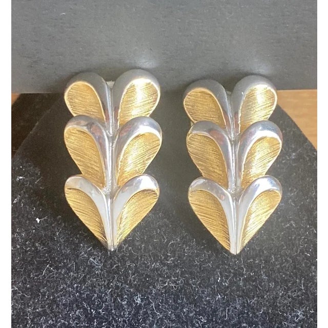 This sophisticated pair of 1980s Les Bernard VO Brushed Gold Earrings will take you from day to night. The unique design...