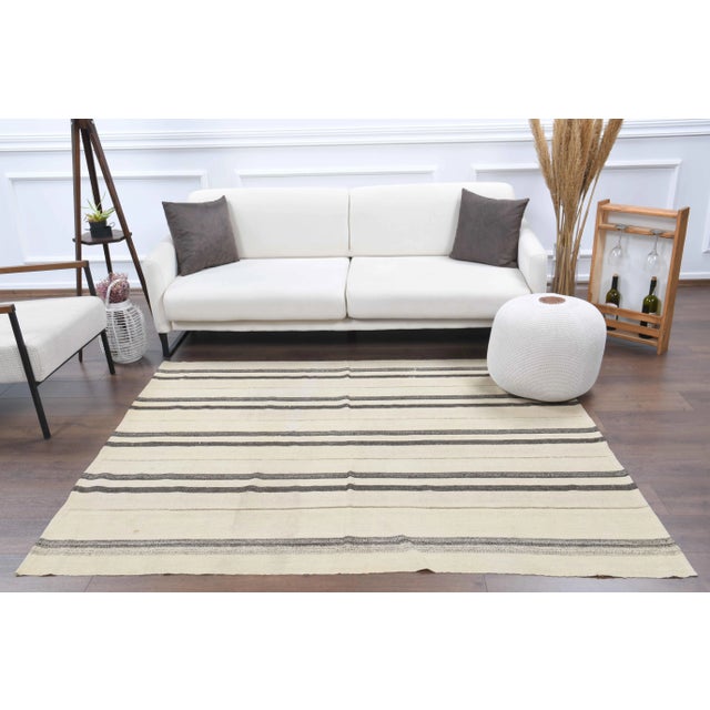 Vintage Turkish Hand-Knotted vintage rug is a semi-antique vintage kilim rug.'70s Eastern region of Turkey's unique rug is...