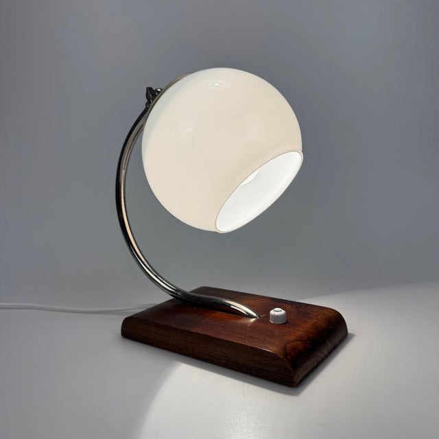 Art Deco Wood and White Glass Table Lamp, 1940s, in Very Good conditions. Designed 1920 to 1949 European Plug (up to...