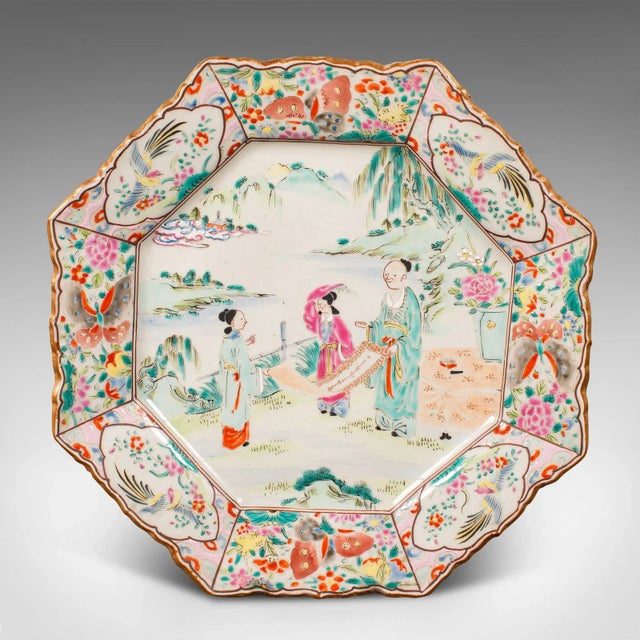 This is an antique octagonal serving plate. A Japanese, ceramic decorative charger, dating to the late Victorian period,...