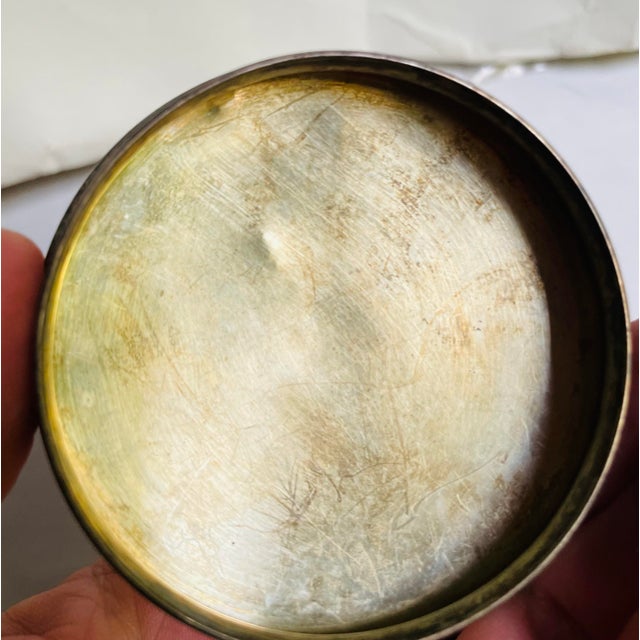 This is a lovely cut glass powder jar with a pretty repeating floral and swag design cut around the jar. It has a plain...