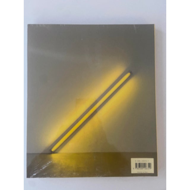 BRAND NEW CONDITION NEVER OPENED AND STILL IN THE PUBLISHERES SHRINK WRAP FILM Dan Flavin (19331996) is considered one of...