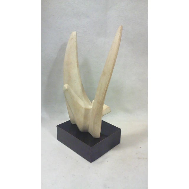 Czech "Winged Dove" stone sculpture created by early Twentieth Century Czechoslovakian artist Klara Sever and masterfully...