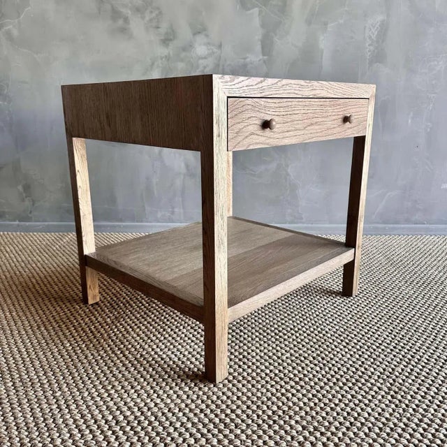 The Harper White Oak Nightstand is the perfect choice for those looking to add a contemporary flair to their bedroom. The...