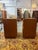 This matching pair of 1970s Danish modern teak nightstands was manufactured by Scan Coll. They feature a striking,...