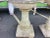 Fantastic pair of large French antique garden urns. Circa 1950, these outdoor urns feature wide scalloped tops over a...