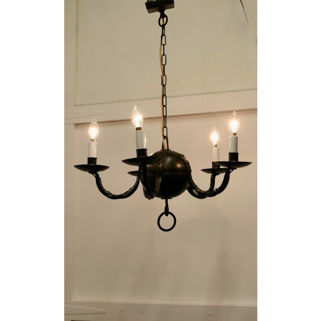 A Superb Gothic Iron and Wood Chandelier A very handsome piece, Large Heavy and very Gothic in design, the light has 5...