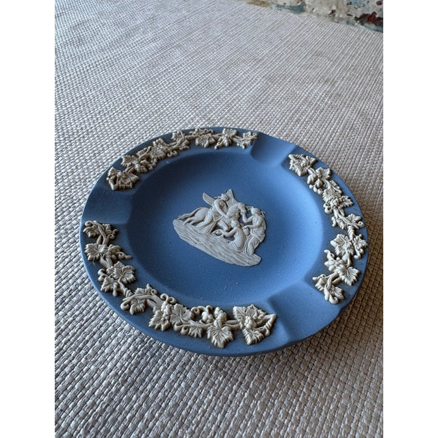 Classic vintage Wedgwood Jasperware dish in the iconic powder blue colorway, featuring crisp white applied relief...