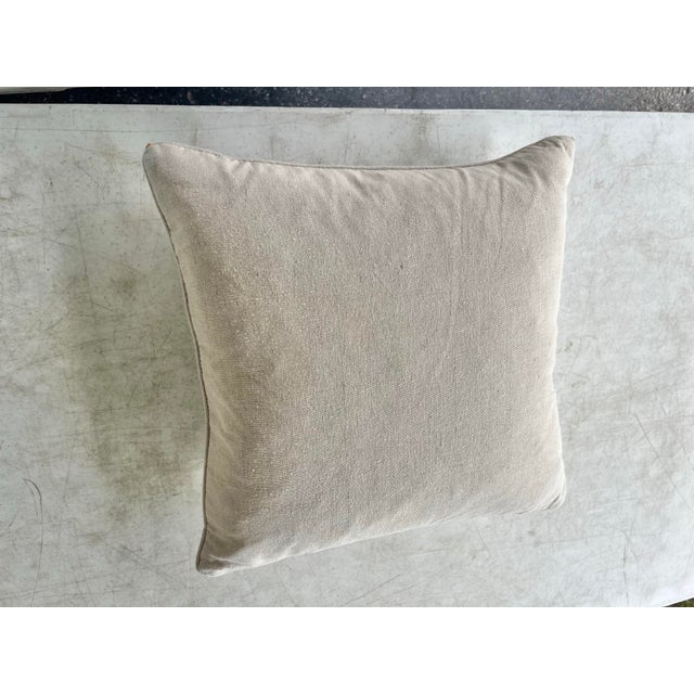 Add a touch of refined, seaside elegance to your interiors with this beautifully crafted coastal accent throw pillow....