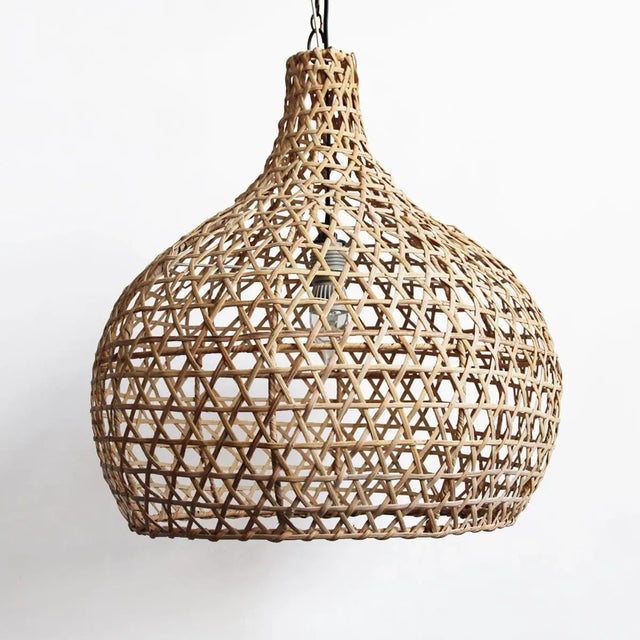 Raw wicker pumpkin lantern. Includes 3' chain and black ceiling canopy. 100 watt max fixture. Bulb not included. Each may...