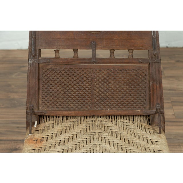 Antique Indian Rustic Low Seat Wooden Chair With Carved Rosettes and Twine Seat For Sale In New York - Image 6 of 14