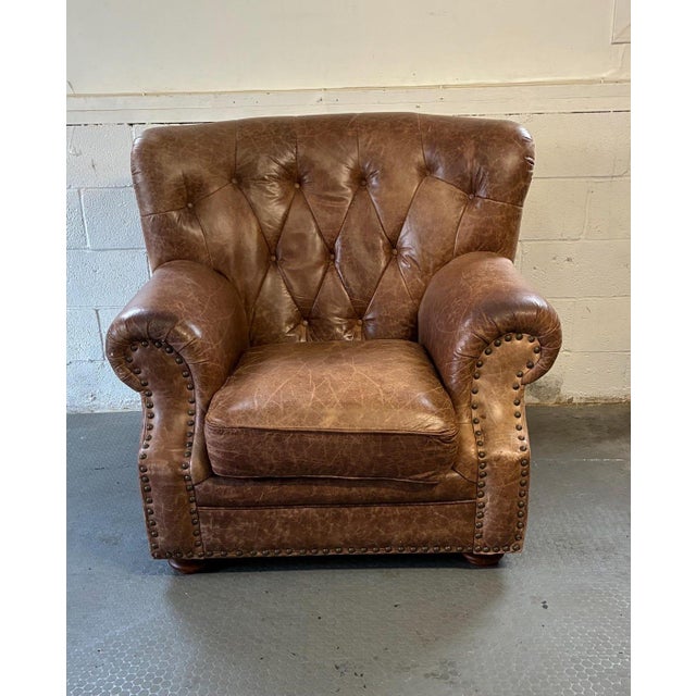 Vintage Leather Library Lounge Chair We love the burnished leather and the nail head detail. Fantastic wide arms and deep...