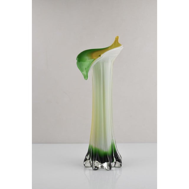 Elegant Italian Murano art glass vase. Executed using the traditional Sommerso technique, the piece features a luminous...