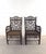 Elegant mid-20th-century Brighton Pavilion bamboo armchairs. Each chair features a sturdy bamboo frame, tightly woven...