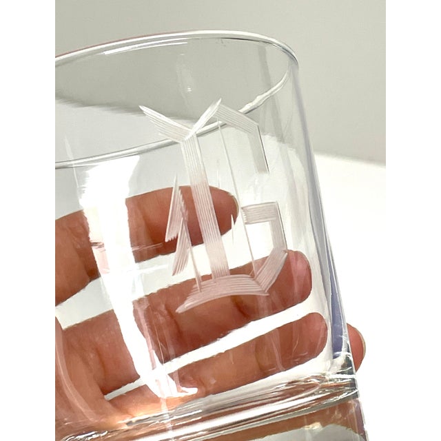 A set of 4 lowball rocks old fashioned glasses engraved monogramed with the letter G.