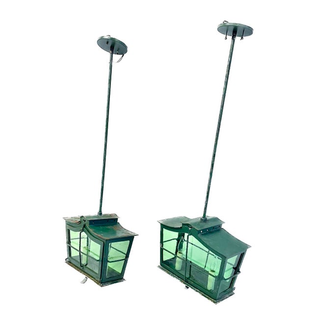 Pair of antique French green lantern style pendants. No maker's marks. Lantern measures: 15.5"L x 7.25" Deep x 12.13"H to...