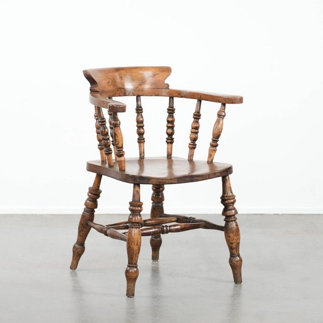 This beautiful antique English captain's chair has acquired a wonderful patina over the years. This chair dates from the...
