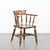 This beautiful antique English captain's chair has acquired a wonderful patina over the years. This chair dates from the...
