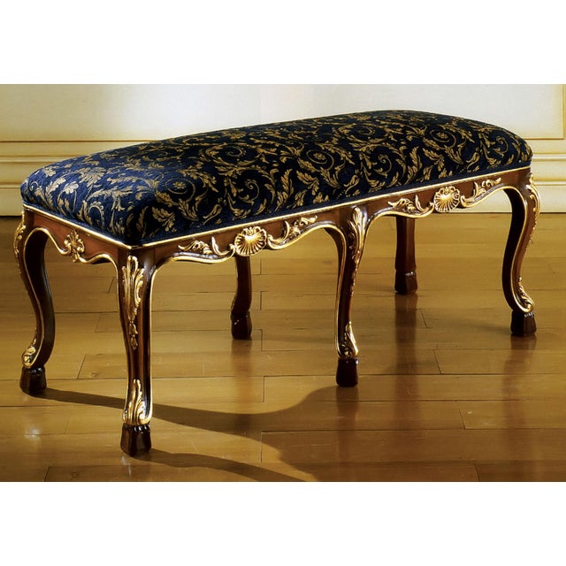 Handcrafted in Italy, this elegant Baroque-style bench features a matte mahogany finish with gold leaf detailing, cabriole...