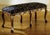 Handcrafted in Italy, this elegant Baroque-style bench features a matte mahogany finish with gold leaf detailing, cabriole...