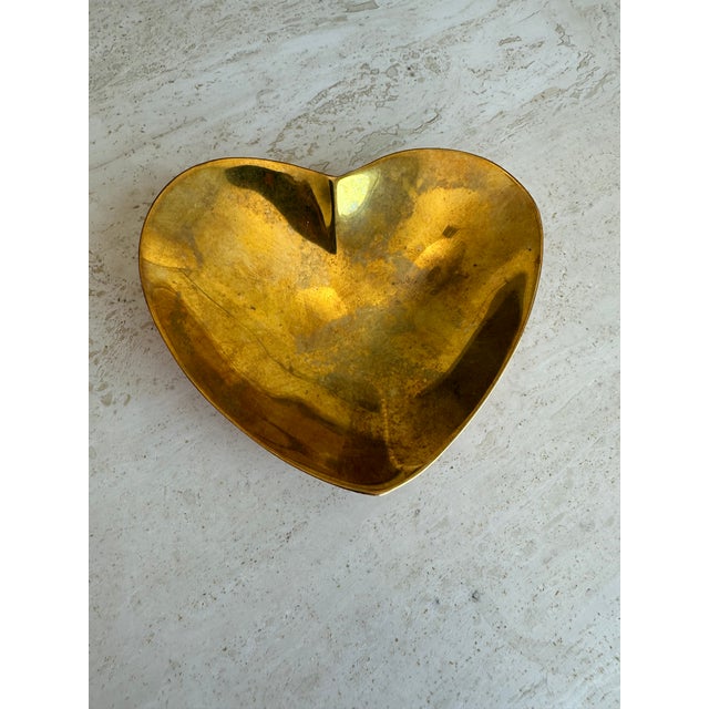 Heavy Jonathan Adler brass heart decorative dish/catchall. Hard to find piece with a beautiful patina. 5 x 4.5 x 1