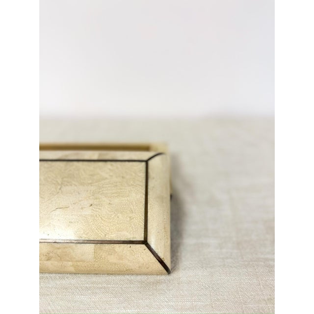 Add a touch of refined vintage luxury to your space with this tessellated stone box in the style of Maitland Smith. Dating...