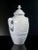 Limoges vase in biscuit ceramic and enamel, with classic style bas -reliefs. Origin france second twentieth century...