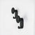 A set of two original wall hooks designed by c. Bartoli for con & con in italy during the 1970s. produced in glossy black...