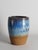 A beautifully crafted Danish studio pottery vase by Michael Andersen & Son, produced on the island of Bornholm. The vessel...