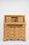 The upper section is fitted with symmetrically arranged drawers, creating a harmonious and architectural layout. Below, a...