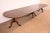 A gorgeous Georgian, Regency, or Queen Anne style solid mahogany triple pedestal extension dining table By Henkel Harris...