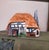 Saxton Cottage is a charming house from the Vintage Britain in Miniature village, crafted from hand-painted ceramics. It...