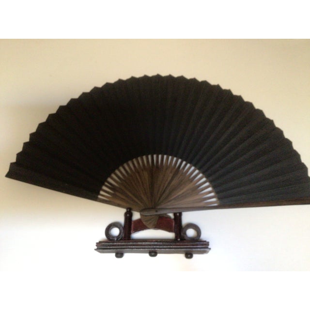 Chinese Paper Fan made of paper and bamboo the painted word means "Good Luck" or"Good Fortune" or "Good Blessing" The...