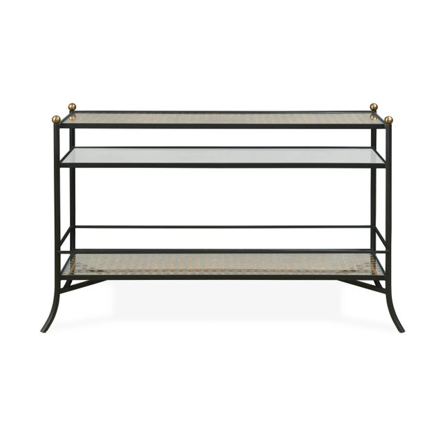 This piece is available only as shown, and will ship in 2-3 weeks. Airy wrought iron and woven cane create the mixed...