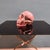 Very rare skull made of Rhodochrosite luciadata mineral. Large and rare skull carved from a single piece of mineral. The...
