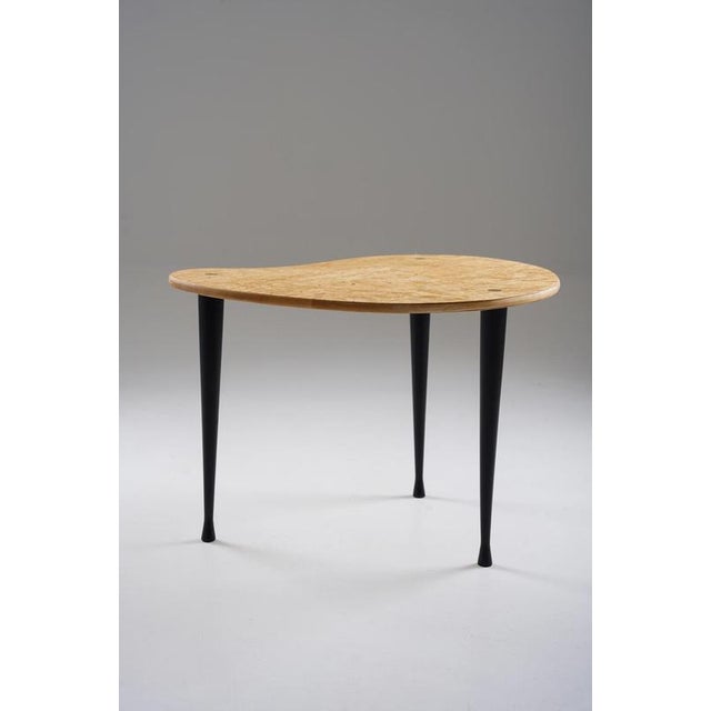 Elegant side table model Palett designed by Yngve Ekström. The organically shaped tabletop is crafted from beautifully...