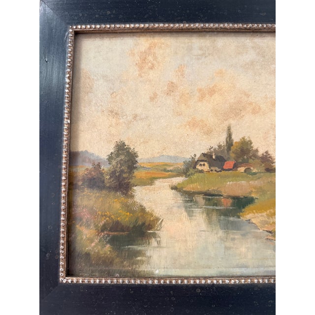 This painting, with its depiction of a tranquil countryside scene featuring a river and cottage, is characteristic of the...