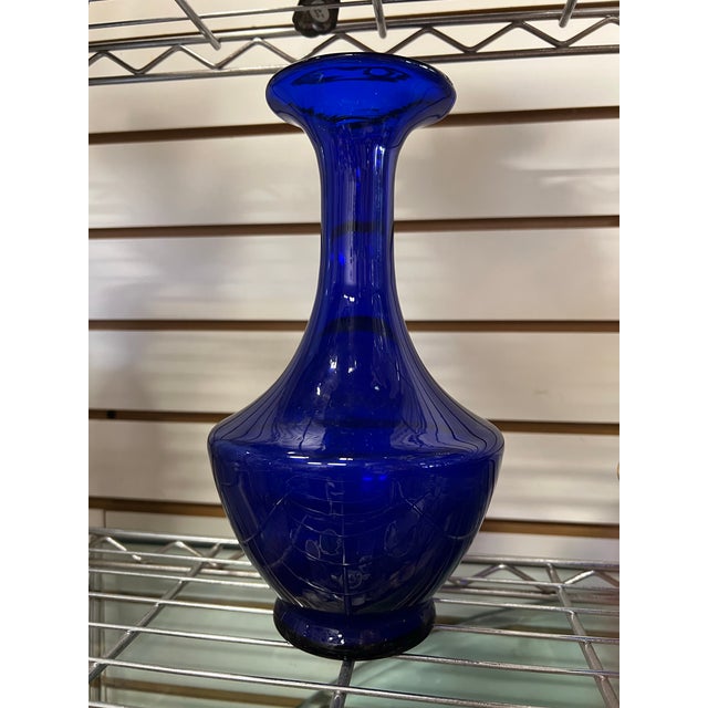 Beautiful Cobalt blue glass vase. The shape of this vase makes me think of “ I dream of jeannie”. Mid century glass vase...