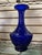 Beautiful Cobalt blue glass vase. The shape of this vase makes me think of “ I dream of jeannie”. Mid century glass vase...