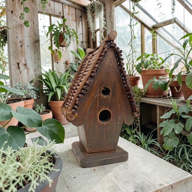Elevate your decor with this Handcrafted Wooden Twig Roof Arts & Crafts Birdhouse, a stunning blend of natural materials...