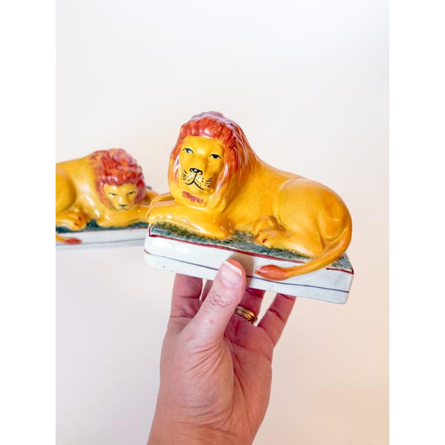 Yellow Antique Staffordshire Recumbent Lion Figurines on Rectangular Plinths - A Pair For Sale - Image 8 of 8