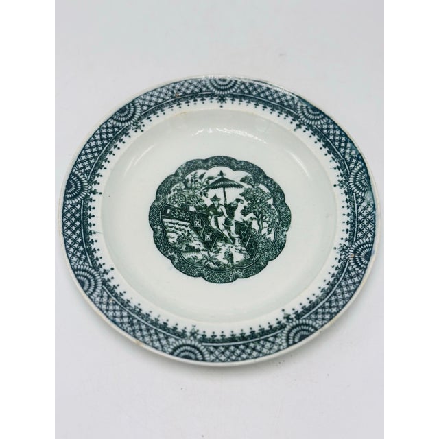 This is an 18th-century English Leeds ware plate, decorated in a refined Chinoiserie “Mandarin” pattern, and dating to...