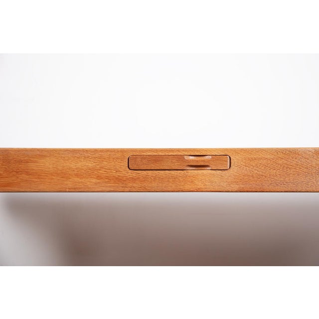 Large Extendable Dining Table in Oak by Guillerme and Chambron for Votre Maison, 1960, in Flawless conditions. Designed...