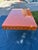 Mid-Century Modern Style High-Gloss Orange Lacquered Wood and Lucite Greek Key Coffee Table by Julio Jimenez For Sale - Image 9 of 17